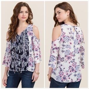 Francesca’s Blue Rain NWT floral Mauve Bria top